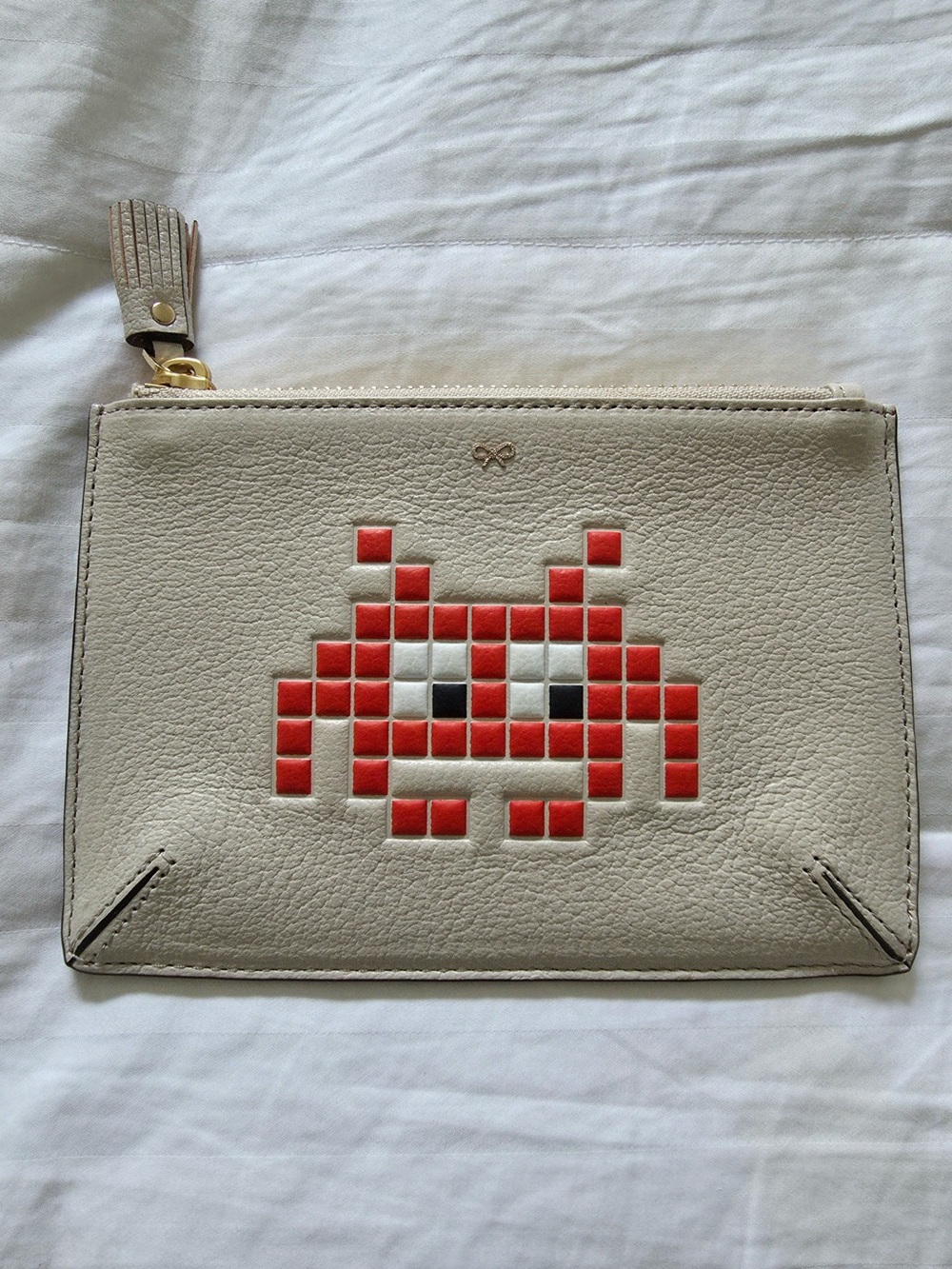 Anya Hindmarch Cream Leather Wristlet Clutch with Red Pixel Alien Motif